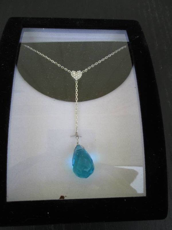 Necklace with blue pendant...