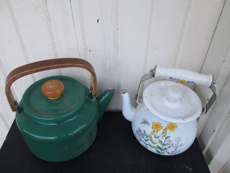 2 vintage tea pots, one has wood ha...