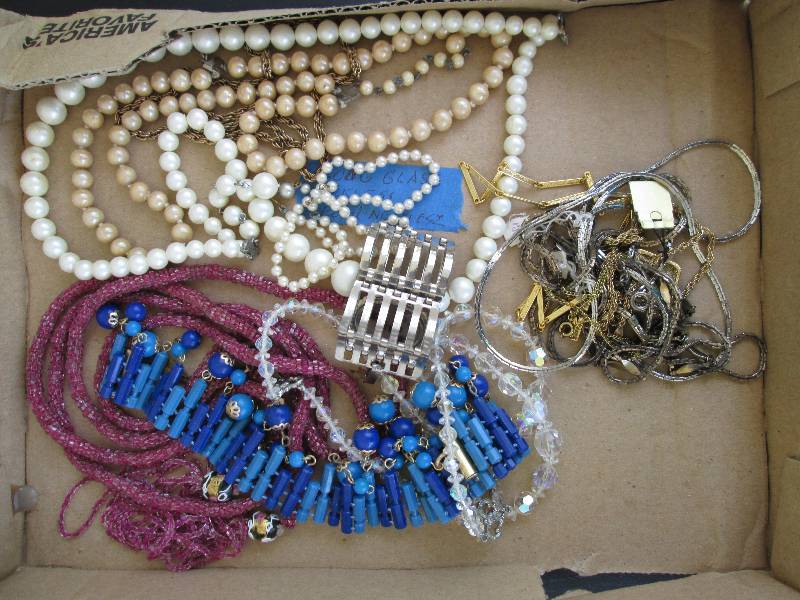 2 pearl and one glass necklaces.  C...