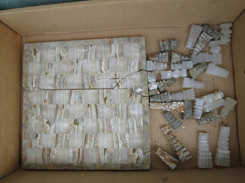 Stone chess set, the base is cracke...