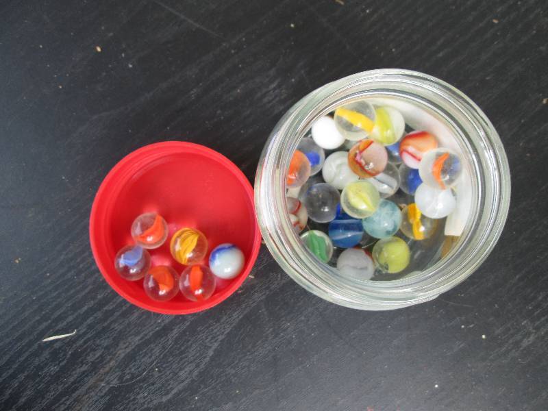 30 cats eye marbles...