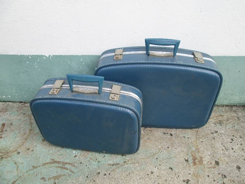 2 vintage blue suitcases...
