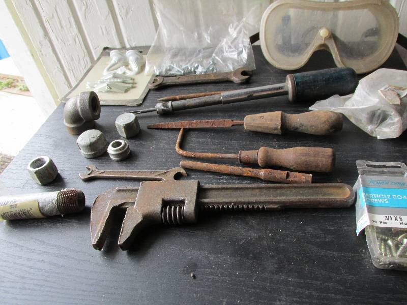 Box of new pipe fittings, new plant...