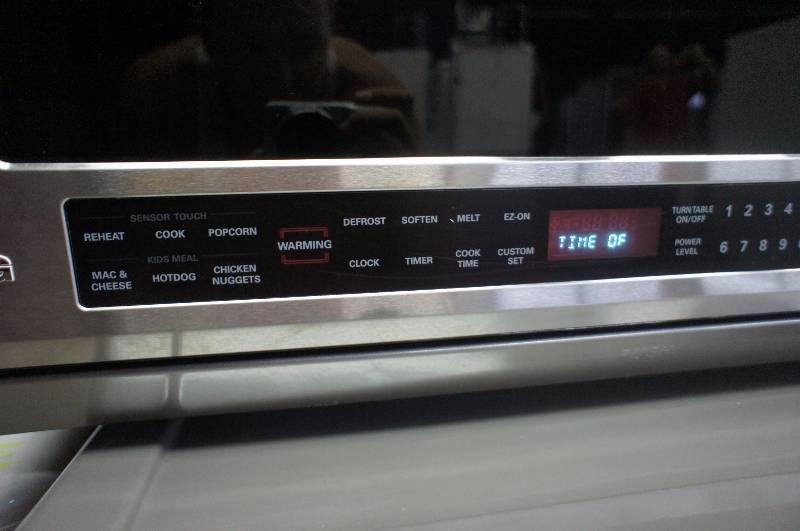 lot 11 image: LG Microwave - Model # (LMHM2017ST)