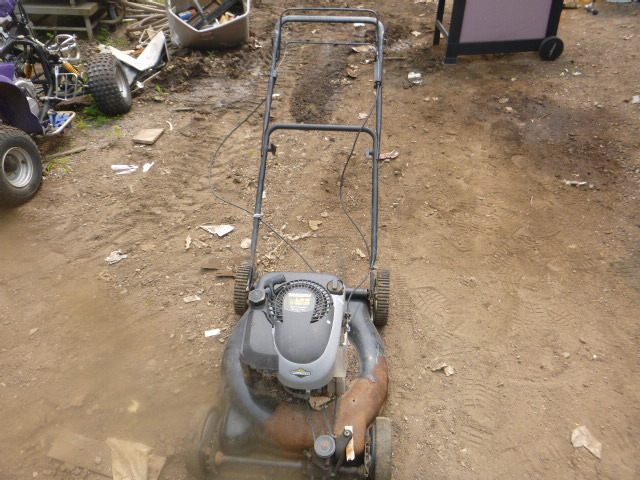lot 24 image: Yard Machines Lawn Mower