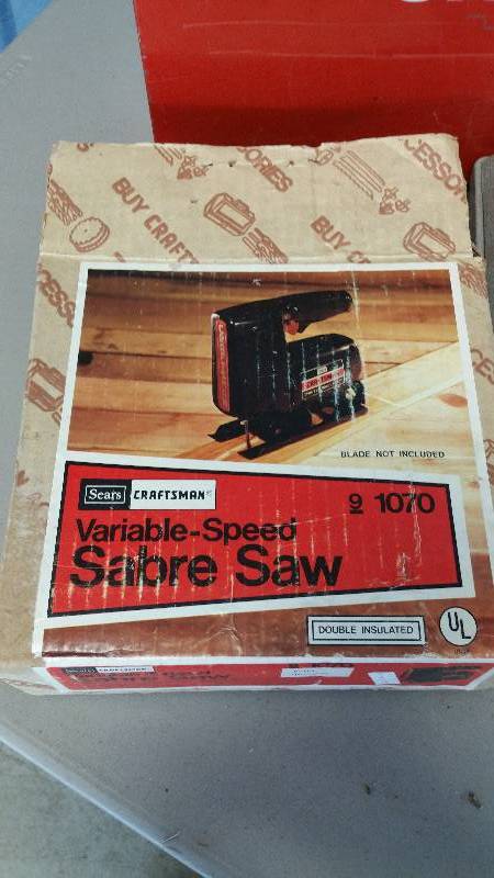 lot 9 image: Group of Power Tools, Including A Bench Grinder, Work Lights, Sawzall Blades, Etc.