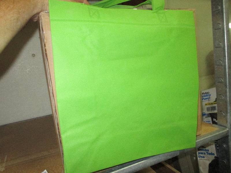 lot 40 image: Box of new tote bags