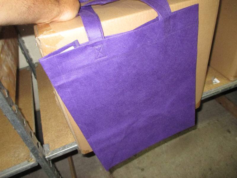 lot 41 image: Box of new tote bags