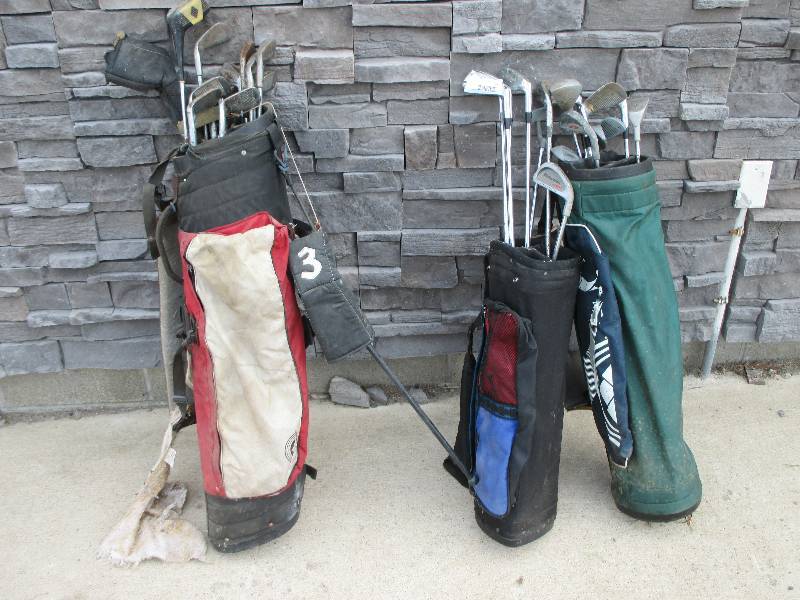 lot 66 image: Golf clubs and bags
