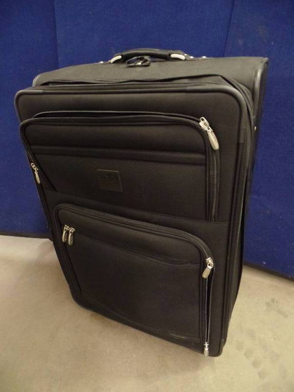 lot 39 image: Large Travel Suitcase