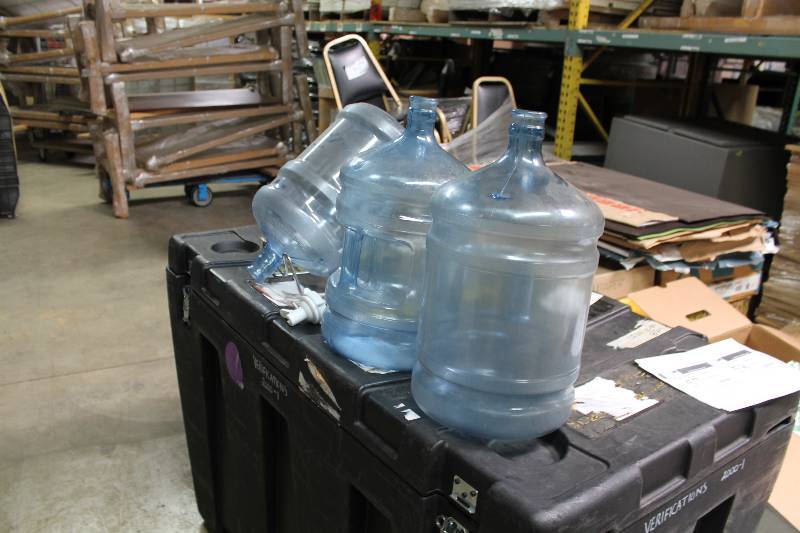 Lot of (5) Including 5 Gallon Poly Carbonate Bottles (3) Metal Stand (1) Plastic Nozzle Spout (1).