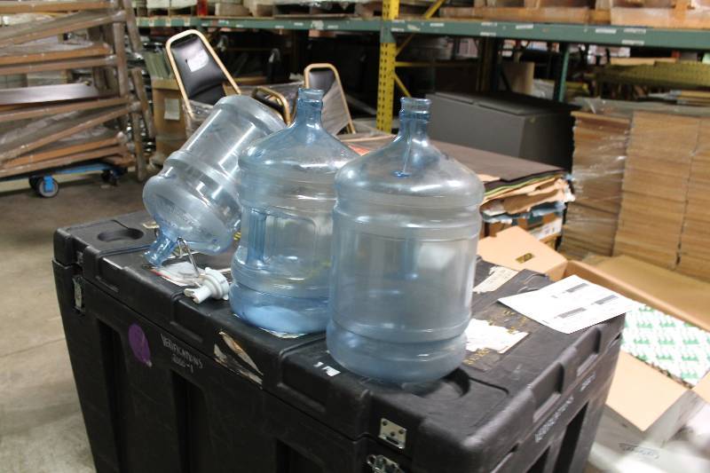 Lot of (5) Including 5 Gallon Poly Carbonate Bottles (3) Metal Stand (1) Plastic Nozzle Spout (1).