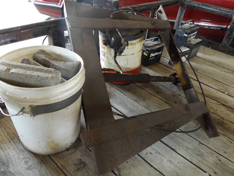 Heavy Metal Frame, Batteries, Chunks of Concrete Block