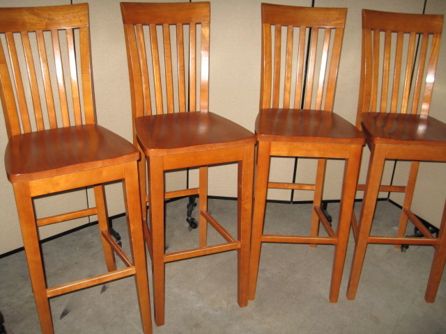 4 very nice bar high chairs, in excellent condition. all solid wood, very sturdy.