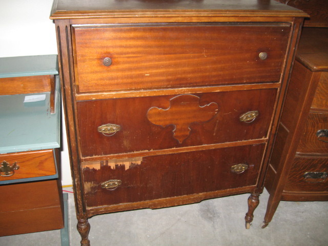 Antique Dresser on wheels, has 3 dove tail drawers.