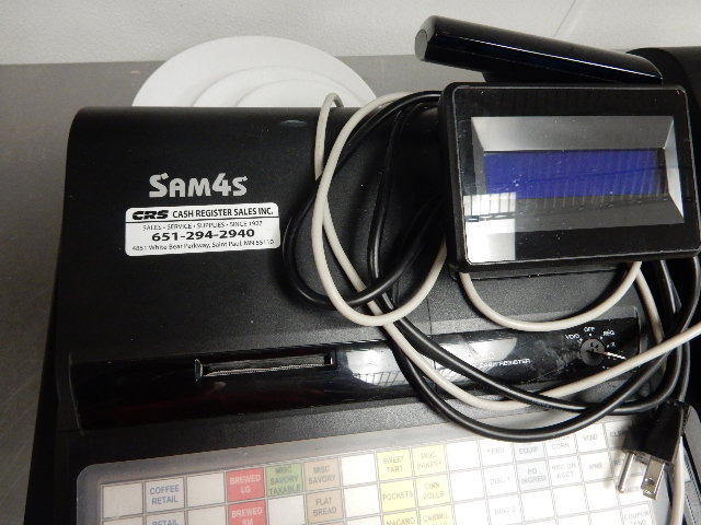 lot 17 image: SAM4S, Electronic Cash Register, ER 924.. This was being used when they closed.