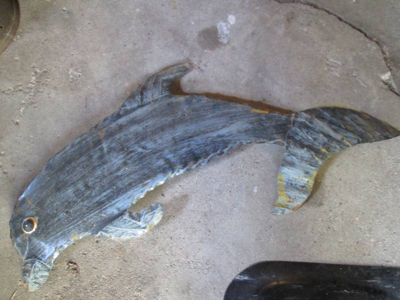Metal fish that says Mexico on the ...