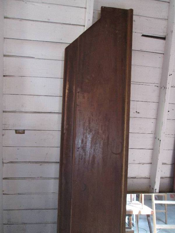 Heavy wood shelf, looks like a bar ...