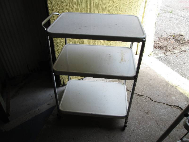 Vintage white metal cart on wheels,...