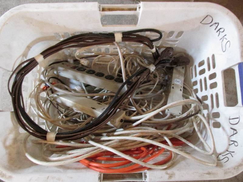 Basket of extension cords and power...