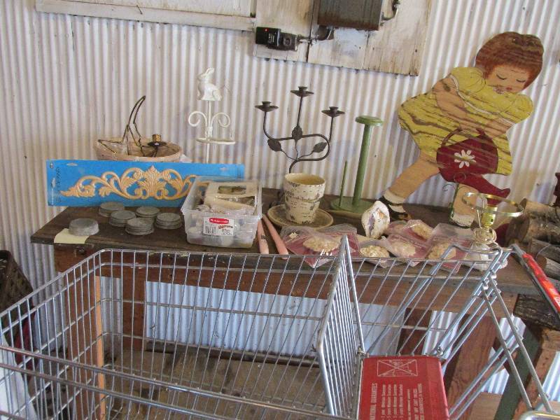 Shopping cart filled with assorted ...