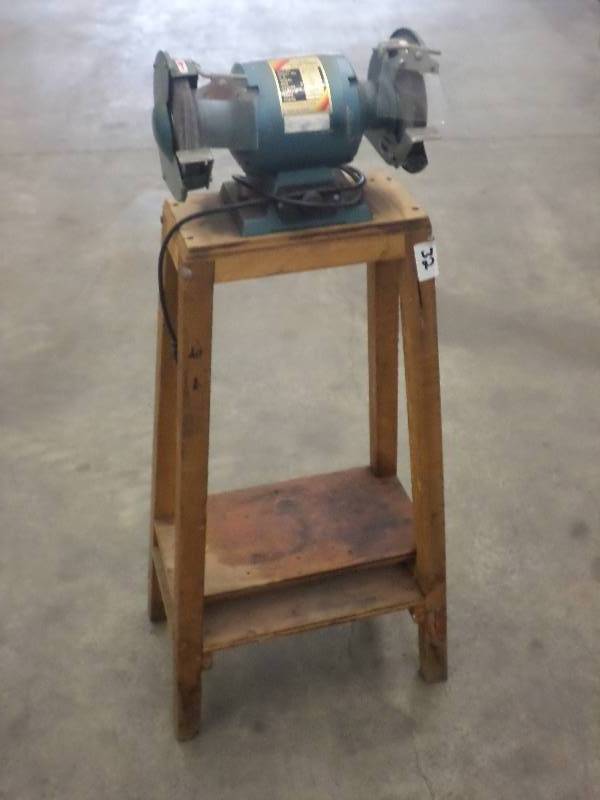 lot 32 image: Menards 12HP 6 Dual Wheel Grinder...