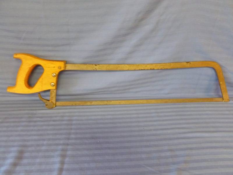 lot 61 image: Vintage Meat Saw