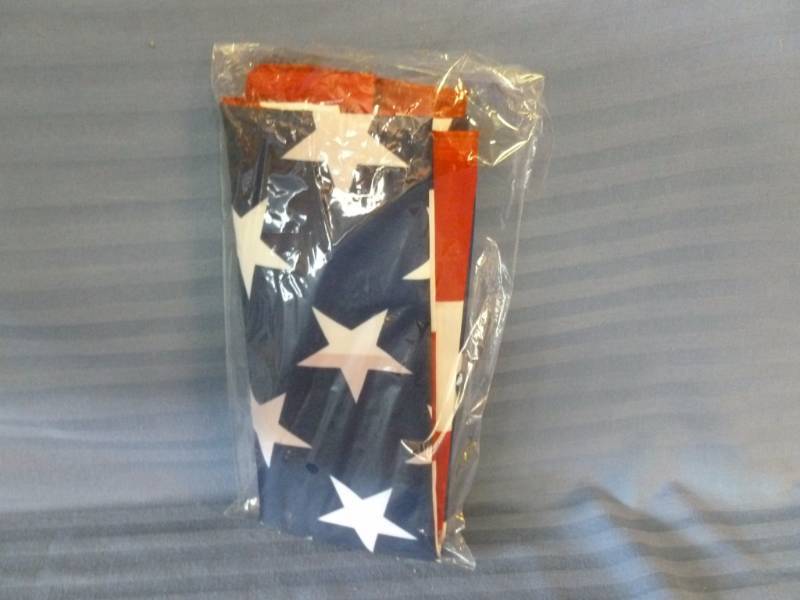 lot 146 image: Brand New U.S Flag