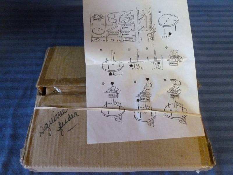 lot 185 image: Wooden Squirrel Feeder