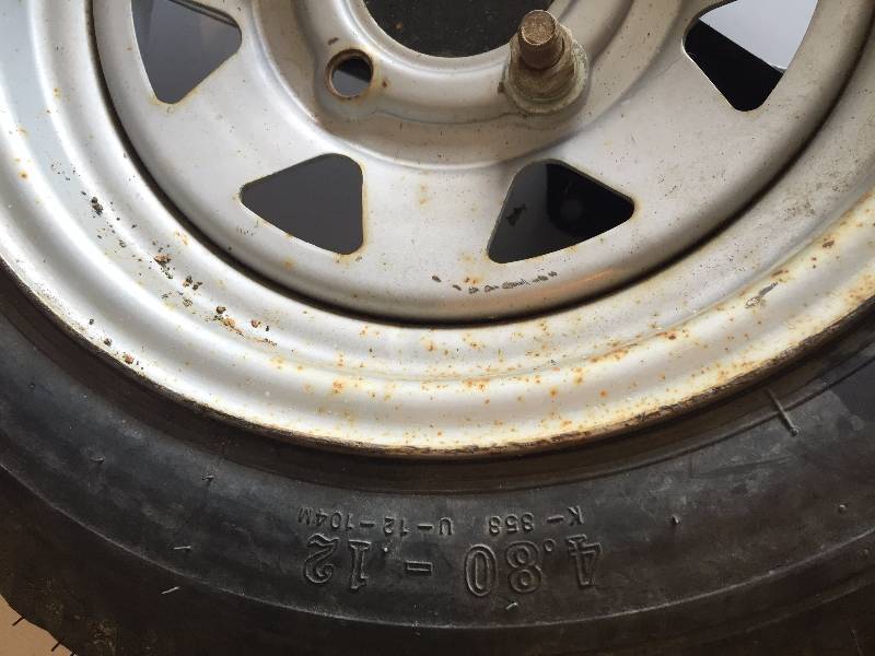 SPARE TIRE WITH RIM AND  BOLT ON CARRIER