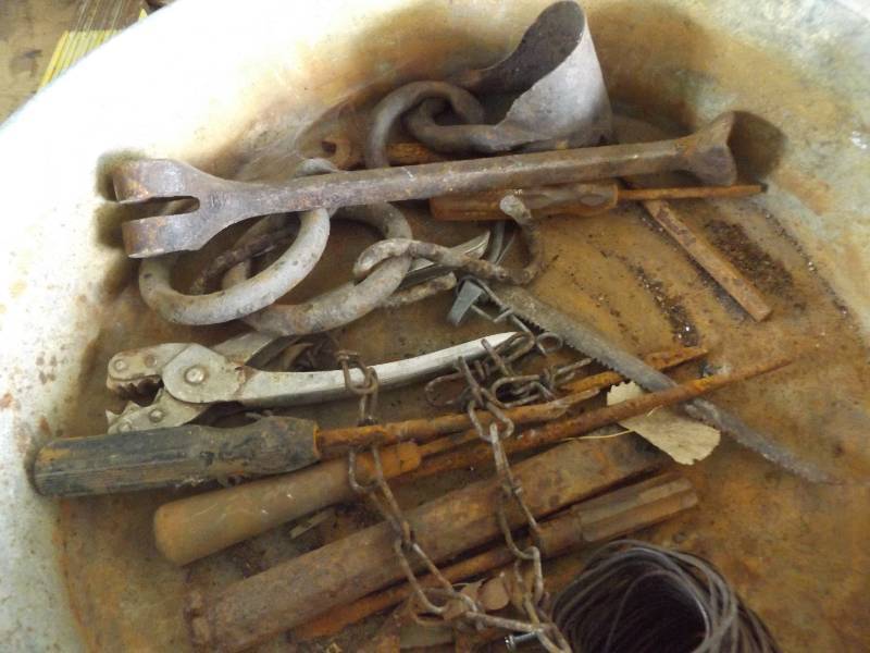 Bucket of Sheetrock screws 2&12, Wood pieces, Carpenters Measuring Stick, pieces of metal,
