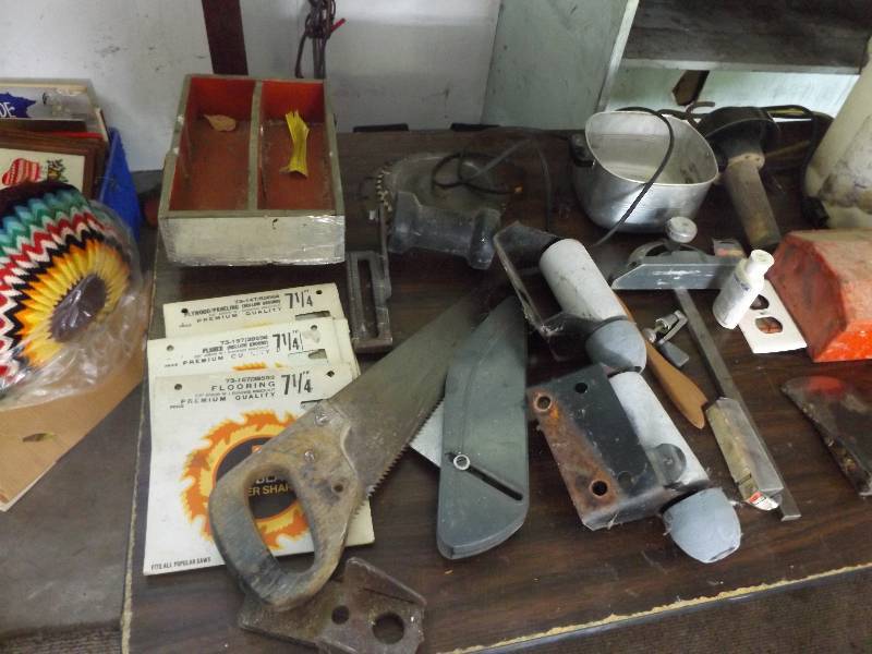 Assortment including Boat Rollers, Axes, Small Metal Tool Box, misc