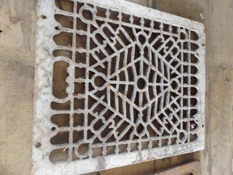 Pair of Old Metal Grates