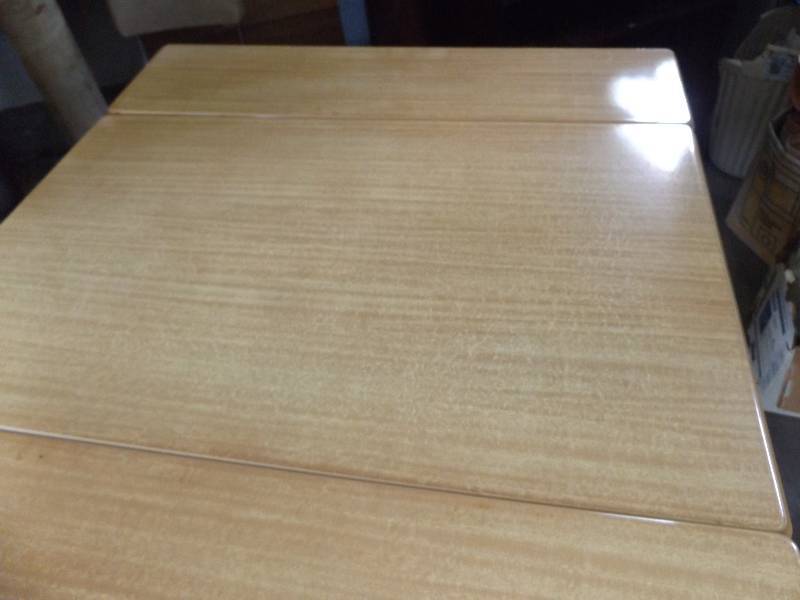 EnamelwareMetal Table Wooden Legs, Silverware Drawer, Leaves push in, good condition.