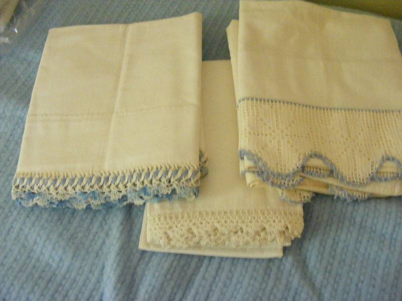 3 Sets of Pillowcases with hand crocheted borders.  Nicely done.