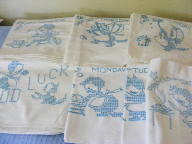 Set of Days of the Week dishtowels.  Done in blue - unusual.