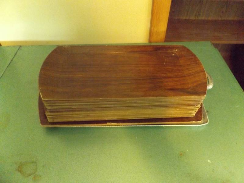 Stack of Metal Serving Trays and 1 Large Silver Serving Tray