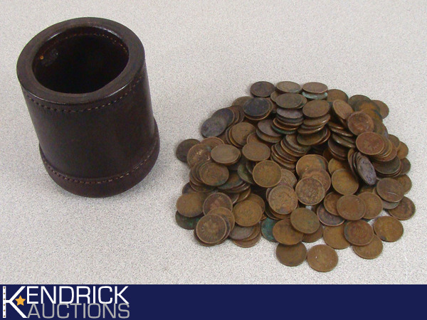 lot 23 image: 225 Antique Indian Head Pennies in Vintage Leather Cup Holder
