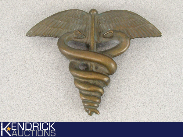lot 29 image: LARGE Solid Brass Medical Symbol Antique Door Knocker