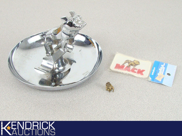 lot 34 image: Mack Truck Ashtray and Other Mack Collectible Items