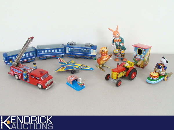 lot 67 image: Large Lot of Vintage Mint Condition Tin Toys
