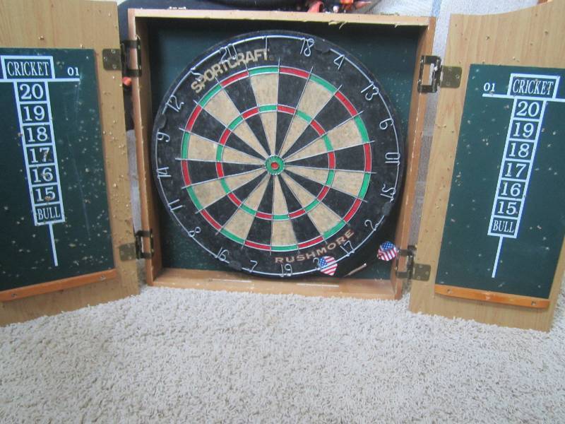 lot 17 image: Dart board that has folding front d...