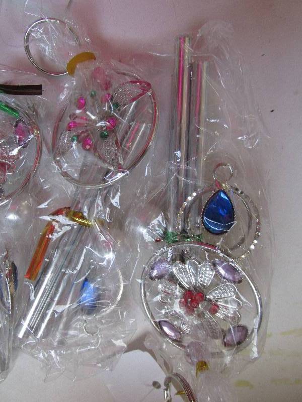 lot 105-COPY image: 12 windchimes new in box...