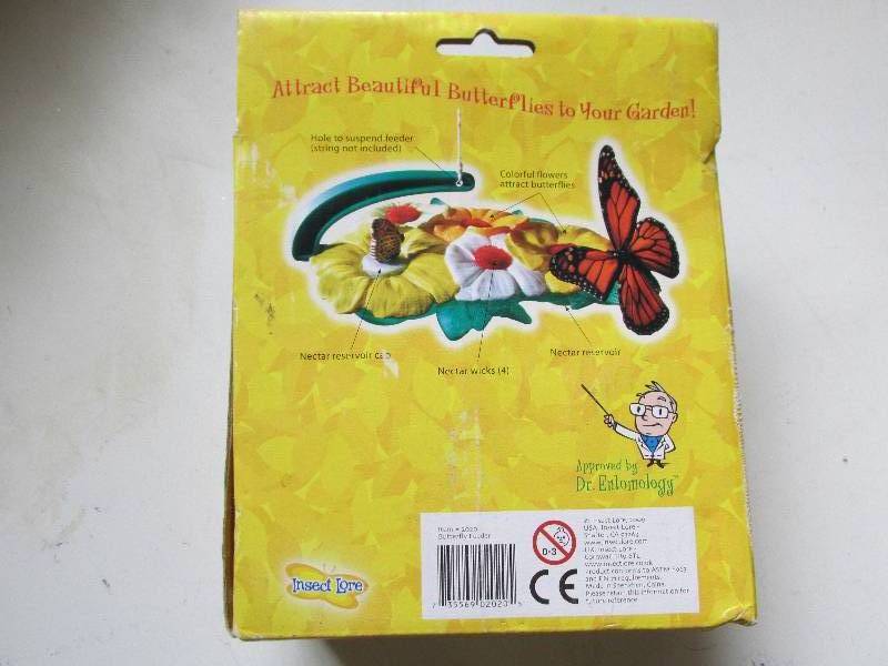 lot 143-COPY image: ne win the box butterfly feeder...