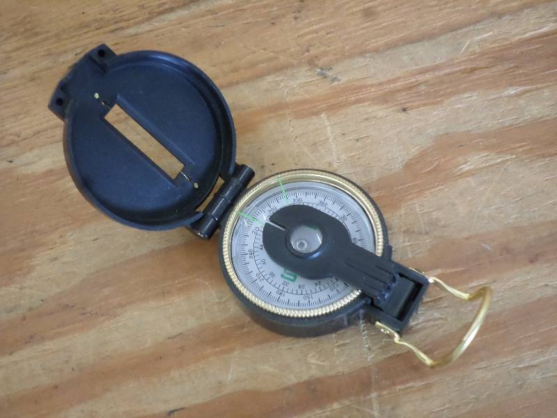 lot 29 image: (1) Pocket Compass With Belt Clip ...