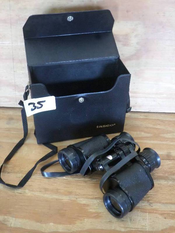 lot 35 image: Tasco 7x-15x35 Binoculars With Case...