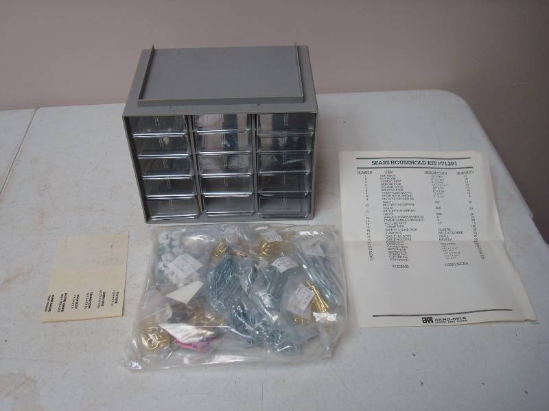 lot 55 image: Akro Mils Plastic Storage Drawer, With Contents, New