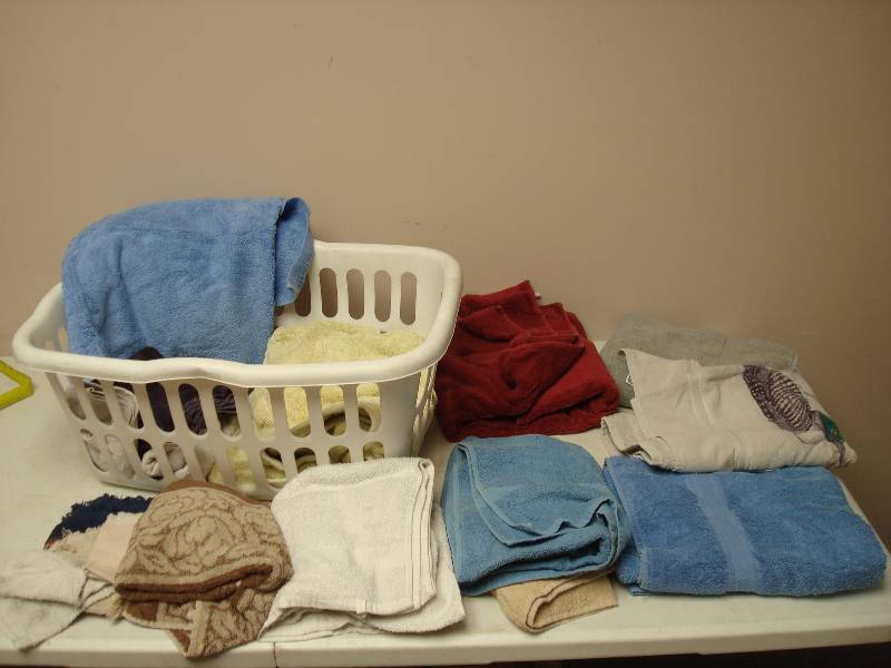 lot 65 image: Basket Filled With Clean Towels And Rags