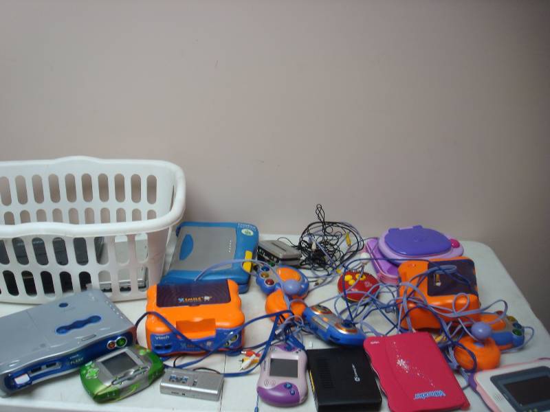 lot 87 image: Basket Filled With Kids Electronics, Untested