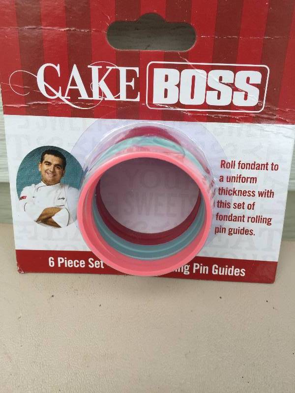 lot 16 image: Cake boss fondant rolling pin guides